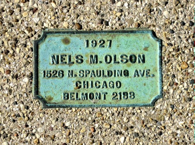 Chicago sidewalk stamp Nels Olson Belmont 