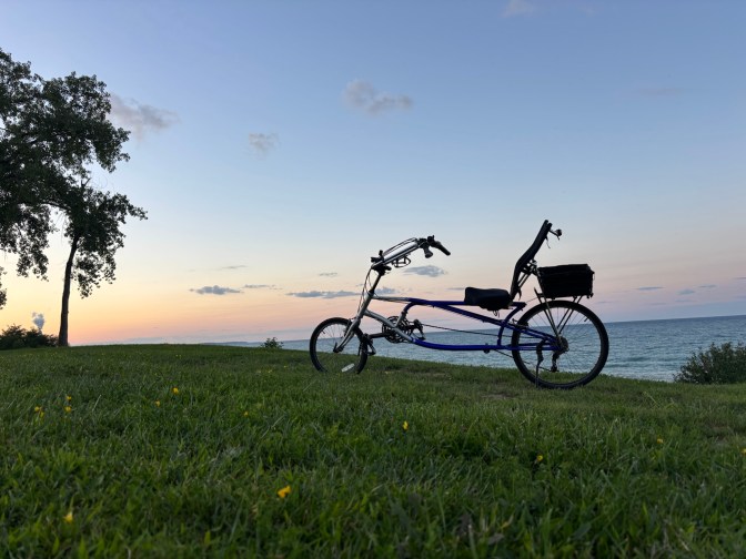 Recumbent bicycle at sunset